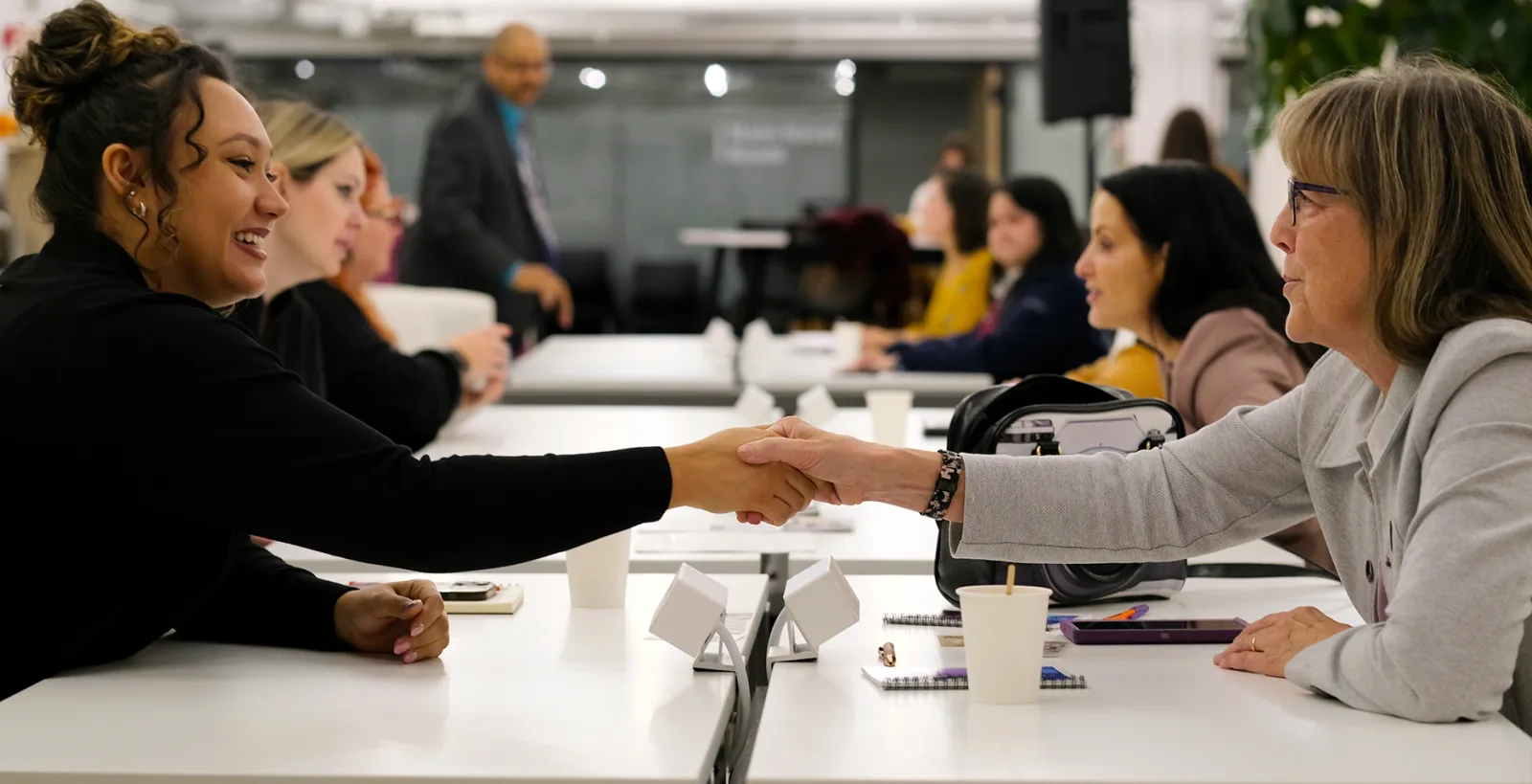 Oakland Thrive business owners connecting at a networking event